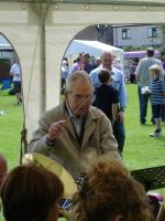 Mr Eccles conducting the band at Hampsthwaite Feast, 20th July 2008 - click for full size image
